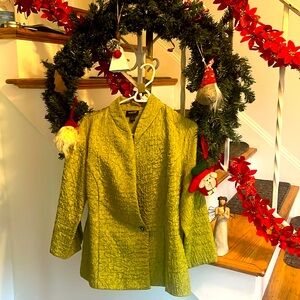 This jacketed is a lime green woh one pure  silver button